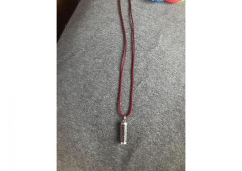Burgundy necklace with little stones/gems inside (cash only)