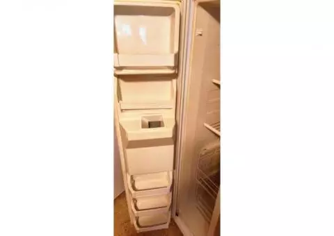 Side by side Whirlpool Refrigerator/Freezer